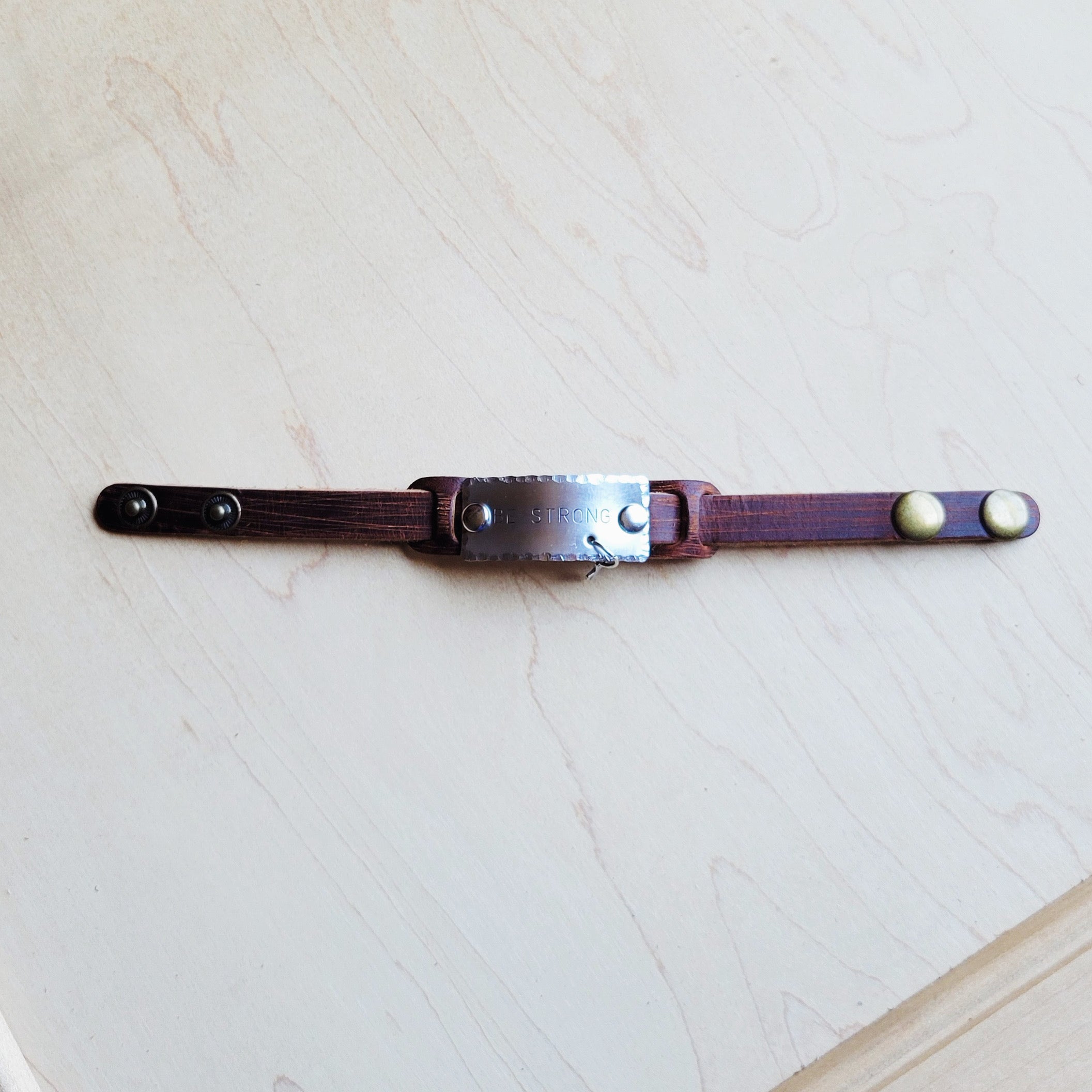 **Be Strong Hand Stamped Leather Cuff 002z